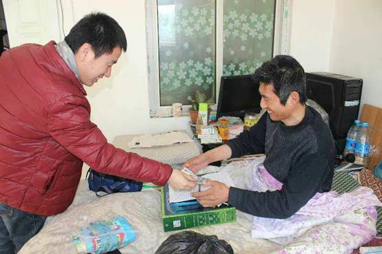 圖為付給殘疾人加工費(fèi)用